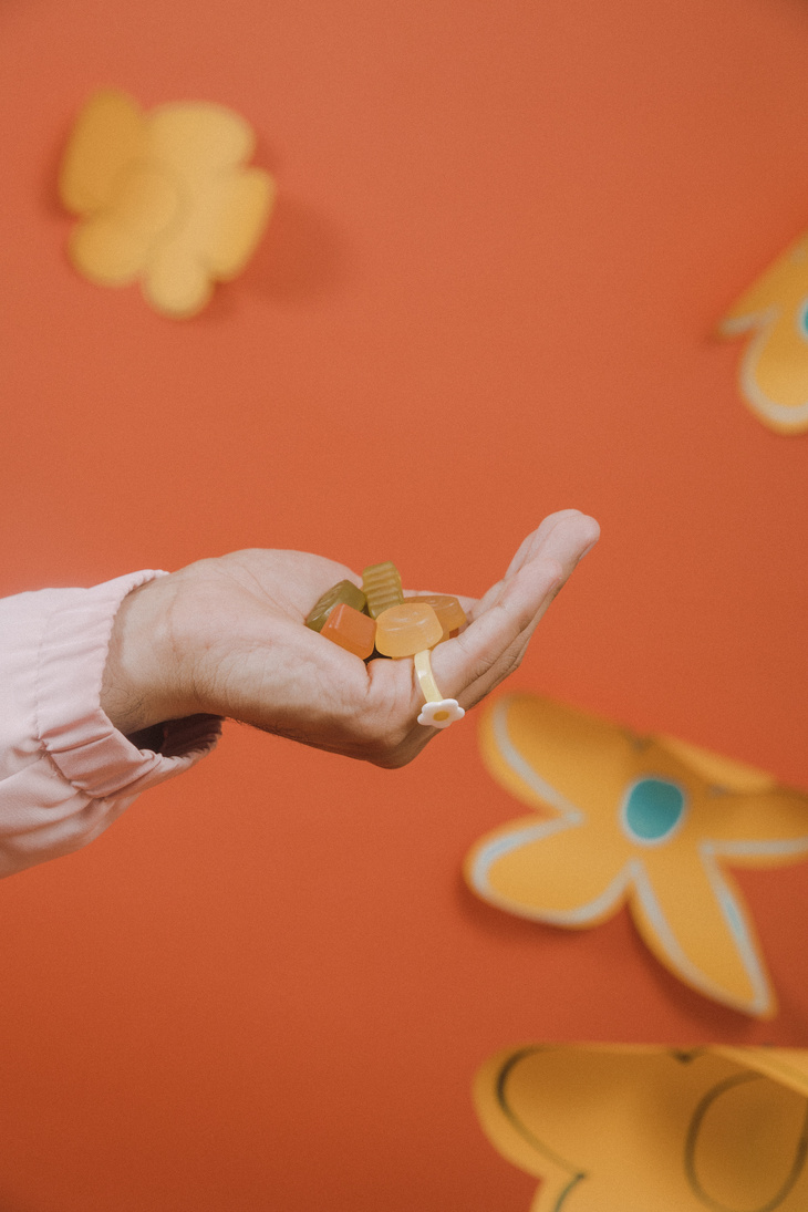 Hand Holding Gummy Candy